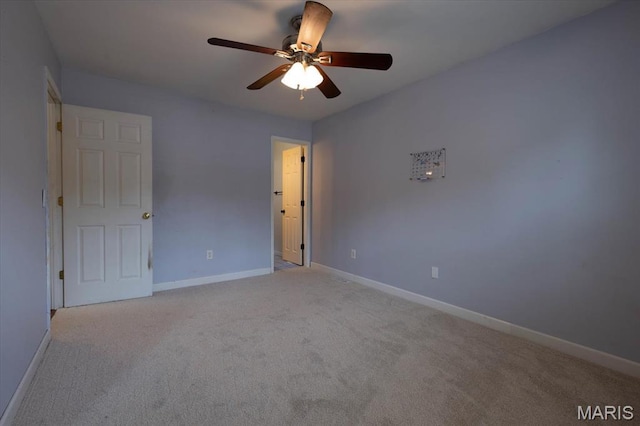 1715 Foxglove Dr, Saint Charles, MO 63303 - carpeted empty room with a ceiling fan and baseboards