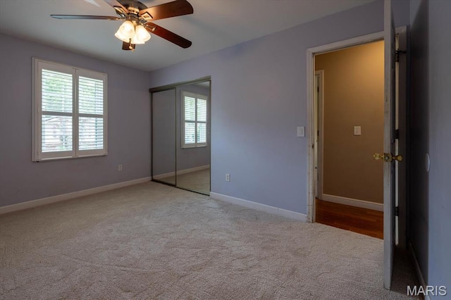 1715 Foxglove Dr, Saint Charles, MO 63303 - unfurnished bedroom featuring carpet flooring, a closet, and a ceiling fan
