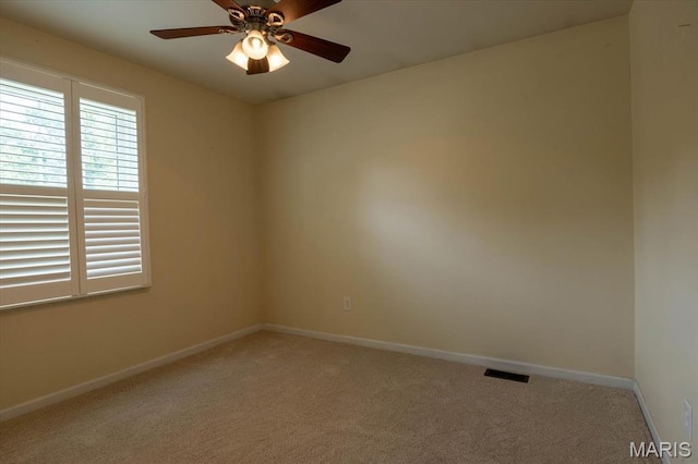 1715 Foxglove Dr, Saint Charles, MO 63303 - unfurnished room featuring light colored carpet and ceiling fan