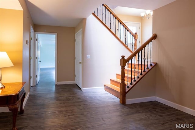 1715 Foxglove Dr, Saint Charles, MO 63303 - stairway with a chandelier and wood finished floors