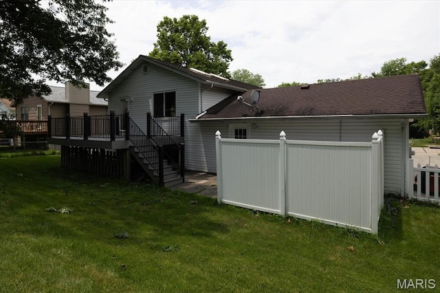 1715 Foxglove Dr, Saint Charles, MO 63303 - back of house featuring a wooden deck and stairs