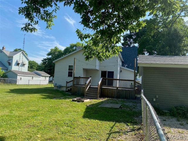 201 N Vine St, Nokomis, IL 62075 - back of property with a wooden deck