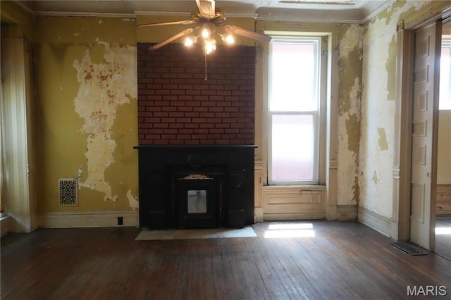 3632 Cook Ave, Saint Louis, MO 63113 - unfurnished living room featuring a ceiling fan, wood-type flooring, healthy amount of natural light, and ornamental molding
