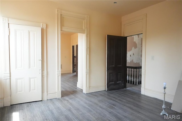 3632 Cook Ave, Saint Louis, MO 63113 - unfurnished bedroom with wood finished floors