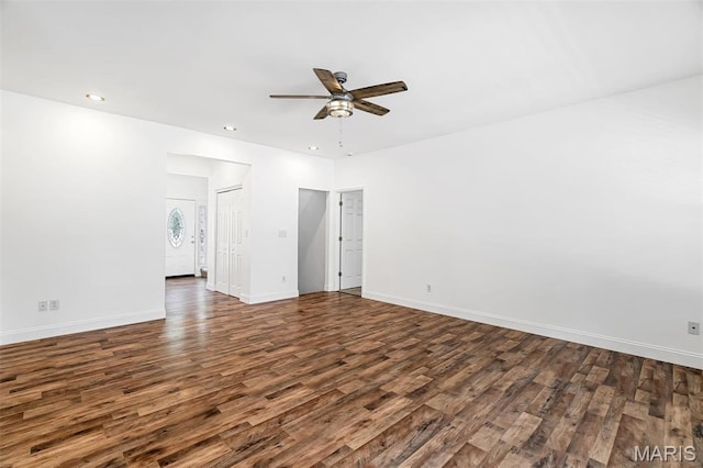 104 Miller Dr, Fenton, MO 63026 - spare room featuring dark wood-type flooring, a ceiling fan, and recessed lighting