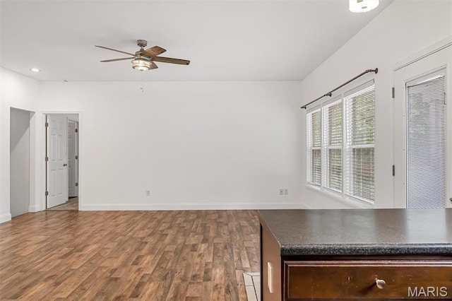 104 Miller Dr, Fenton, MO 63026 - spare room with a ceiling fan and wood finished floors