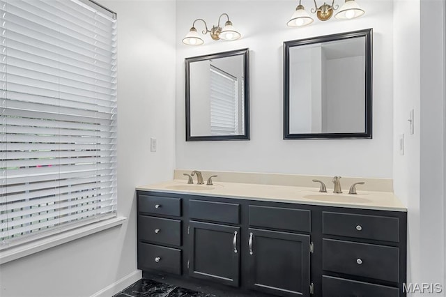 104 Miller Dr, Fenton, MO 63026 - bathroom featuring double vanity and baseboards