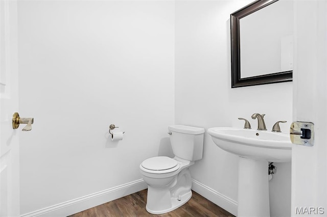 104 Miller Dr, Fenton, MO 63026 - half bath with baseboards and wood finished floors