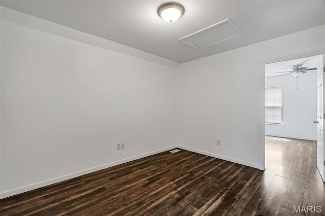 104 Miller Dr, Fenton, MO 63026 - spare room with dark wood-style floors, attic access, and ceiling fan