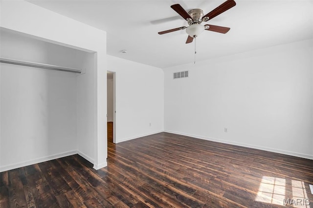 104 Miller Dr, Fenton, MO 63026 - unfurnished bedroom featuring dark wood-type flooring, a closet, and ceiling fan