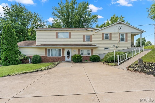 4840 S Point Rd, Washington, MO 63090 - view of front facade with brick siding and a front yard