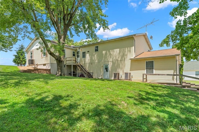 4840 S Point Rd, Washington, MO 63090 - rear view of property with a lawn and stairs