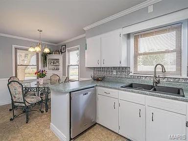 4840 S Point Rd, Washington, MO 63090 - kitchen featuring dishwasher, a peninsula, ornamental molding, a chandelier, and white cabinetry