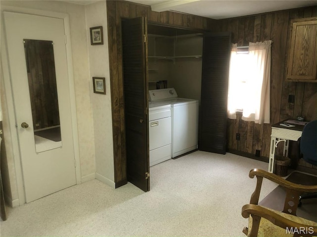 4840 S Point Rd, Washington, MO 63090 - laundry area featuring washing machine and dryer, wooden walls, and light carpet