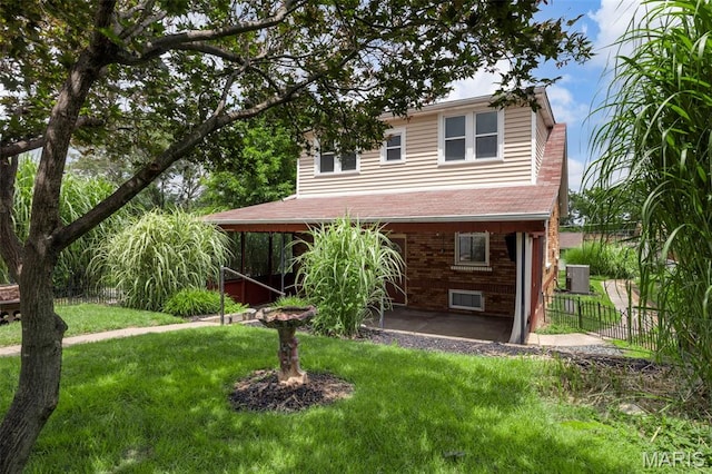 10122 Niblic Dr, Saint Louis, MO 63114 - view of front of house featuring a patio and brick siding