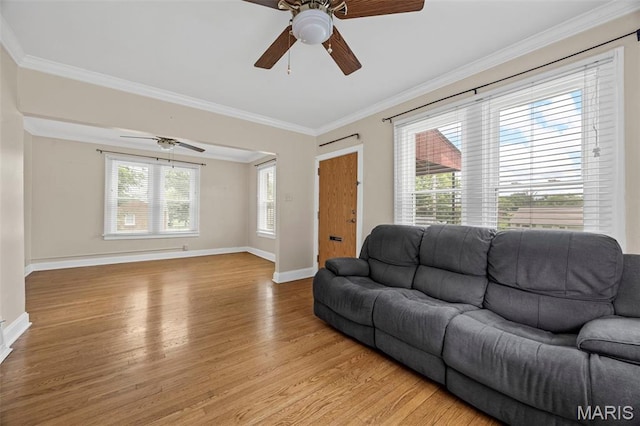 10122 Niblic Dr, Saint Louis, MO 63114 - living room with a ceiling fan, light wood-style flooring, and ornamental molding