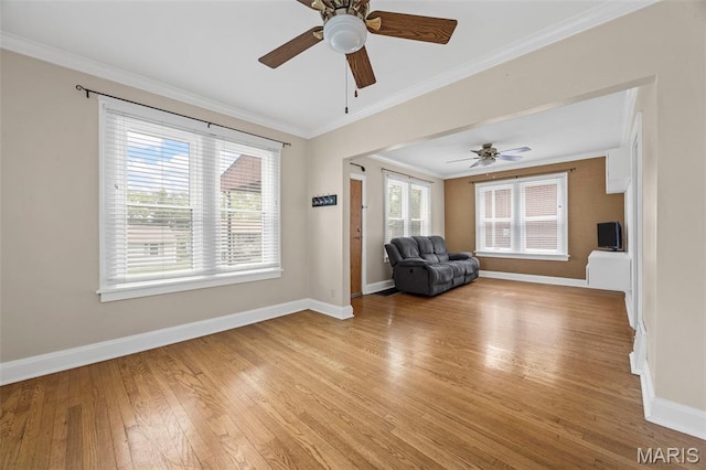 10122 Niblic Dr, Saint Louis, MO 63114 - unfurnished living room featuring light wood-style floors, crown molding, and a ceiling fan