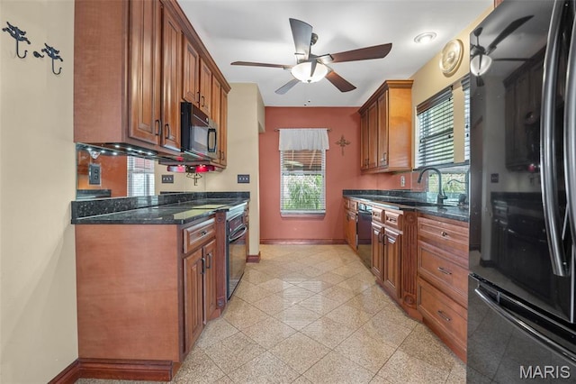 10122 Niblic Dr, Saint Louis, MO 63114 - kitchen with black appliances, granite tiled floors, ceiling fan, and brown cabinets