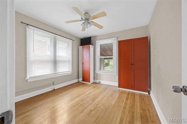 10122 Niblic Dr, Saint Louis, MO 63114 - unfurnished bedroom with light wood-style flooring and ceiling fan