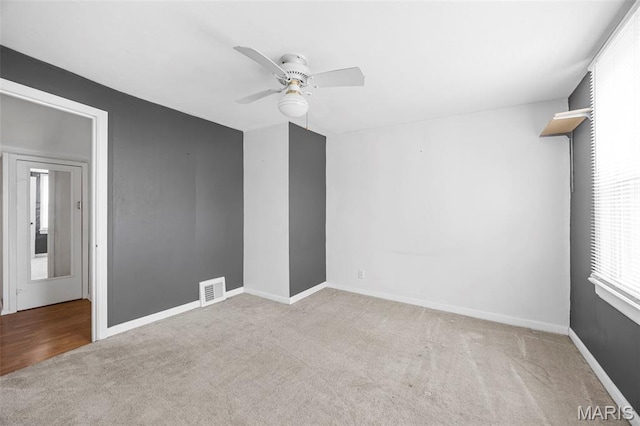 10122 Niblic Dr, Saint Louis, MO 63114 - carpeted empty room with ceiling fan and baseboards