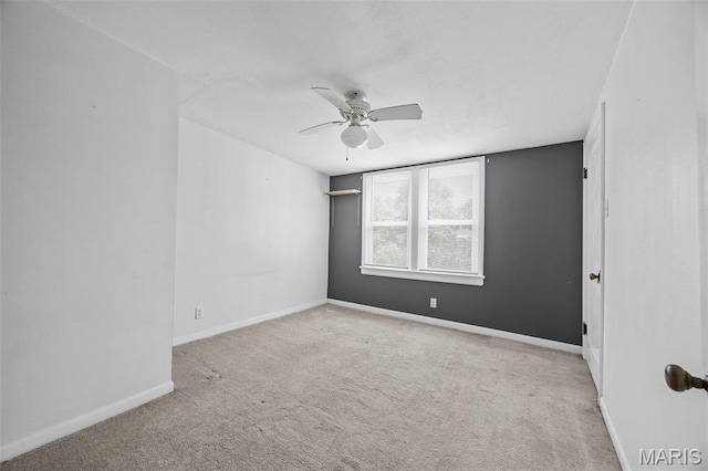 10122 Niblic Dr, Saint Louis, MO 63114 - carpeted empty room featuring a ceiling fan and baseboards