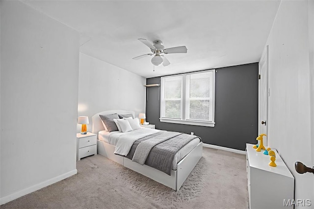 10122 Niblic Dr, Saint Louis, MO 63114 - bedroom featuring light carpet and ceiling fan