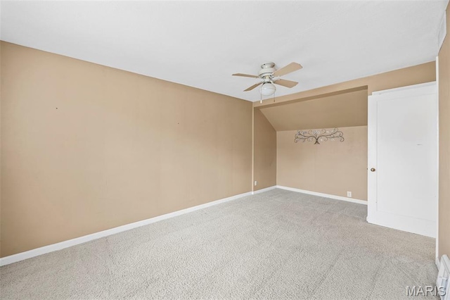 10122 Niblic Dr, Saint Louis, MO 63114 - unfurnished room featuring ceiling fan, carpet floors, and vaulted ceiling