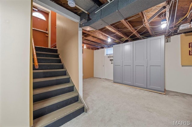 10122 Niblic Dr, Saint Louis, MO 63114 - basement with stairs and carpet