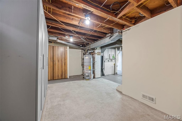 10122 Niblic Dr, Saint Louis, MO 63114 - unfinished below grade area featuring water heater