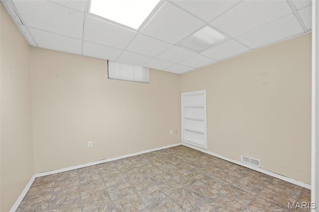 10122 Niblic Dr, Saint Louis, MO 63114 - spare room with a paneled ceiling and baseboards