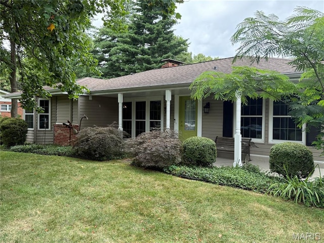 9457 Chavez Dr, Sunset Hills, MO 63127 - ranch-style house featuring a front yard, a porch, roof with shingles, and a chimney