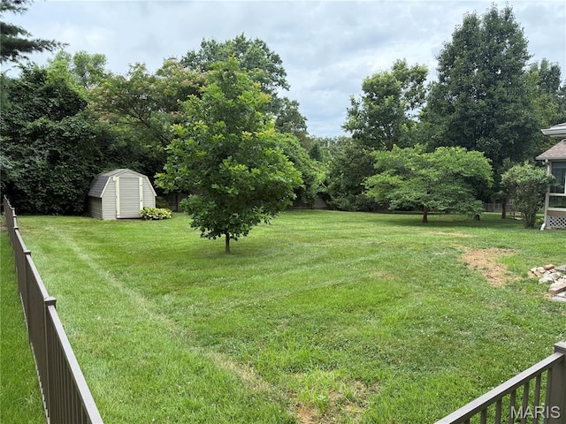 9457 Chavez Dr, Sunset Hills, MO 63127 - view of yard featuring a storage unit