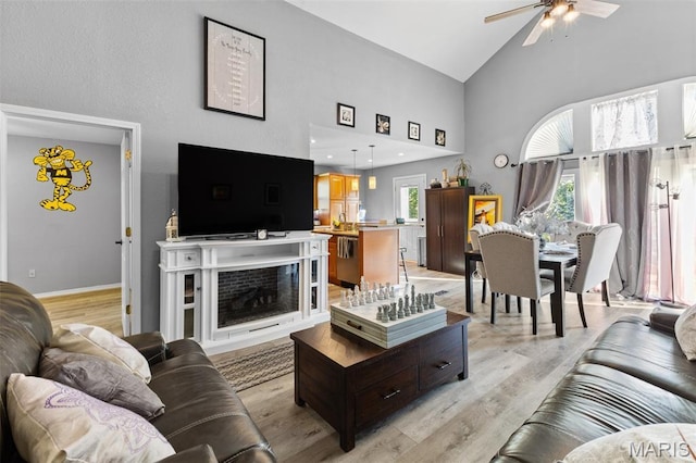 441 Rue Martel, Bonne Terre, MO 63628 - living room with high vaulted ceiling, ceiling fan, and light wood-style flooring