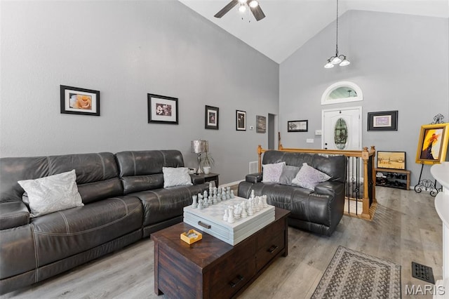 441 Rue Martel, Bonne Terre, MO 63628 - living room featuring a ceiling fan, high vaulted ceiling, and light wood-style flooring