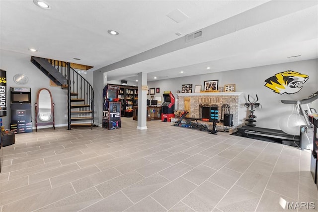 441 Rue Martel, Bonne Terre, MO 63628 - tiled living room featuring stairs, a fireplace, and recessed lighting