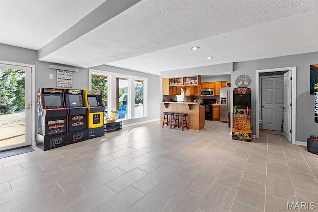 441 Rue Martel, Bonne Terre, MO 63628 - living room with a textured ceiling, recessed lighting, and light tile patterned floors