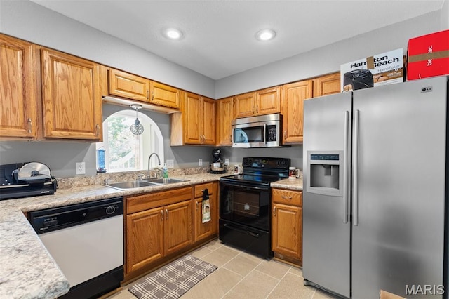 441 Rue Martel, Bonne Terre, MO 63628 - kitchen with appliances with stainless steel finishes, light countertops, recessed lighting, and brown cabinetry
