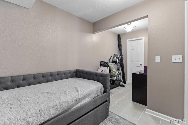 441 Rue Martel, Bonne Terre, MO 63628 - bedroom featuring tile patterned floors and a textured wall