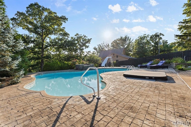 441 Rue Martel, Bonne Terre, MO 63628 - view of swimming pool featuring a water slide and a patio