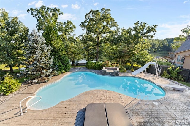 441 Rue Martel, Bonne Terre, MO 63628 - view of swimming pool with a water slide, a patio, and a diving board