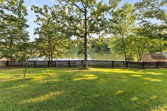 441 Rue Martel, Bonne Terre, MO 63628 - fenced backyard featuring a water view