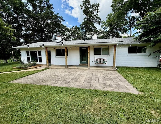 10107 Cannon Mines Rd, Cadet, MO 63630 - back of property featuring a yard, brick siding, and a porch