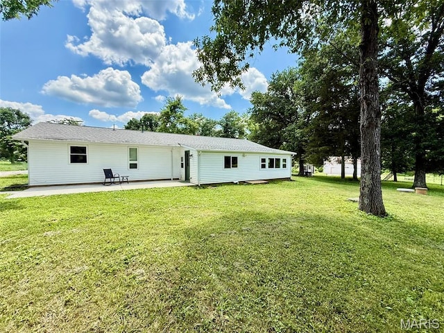 10107 Cannon Mines Rd, Cadet, MO 63630 - rear view of house with a patio and a lawn