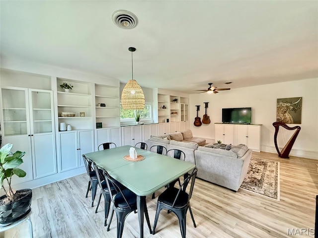 10107 Cannon Mines Rd, Cadet, MO 63630 - dining area featuring light wood-style floors and ceiling fan