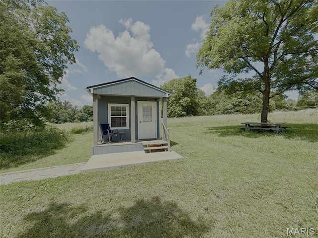 10107 Cannon Mines Rd, Cadet, MO 63630 - view of grassy yard featuring an outbuilding