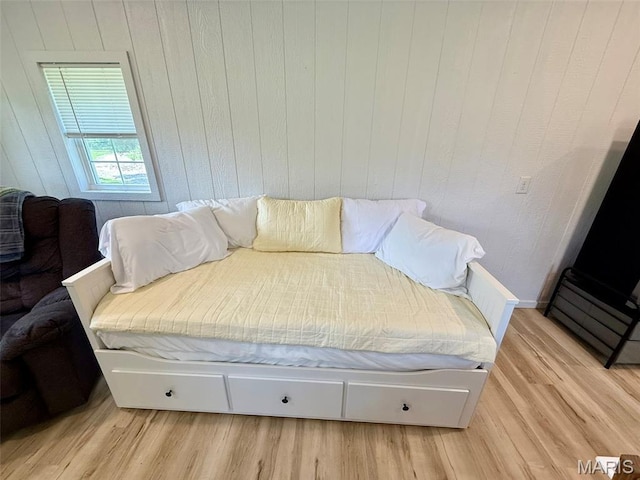10107 Cannon Mines Rd, Cadet, MO 63630 - bedroom with light wood-type flooring and wood walls