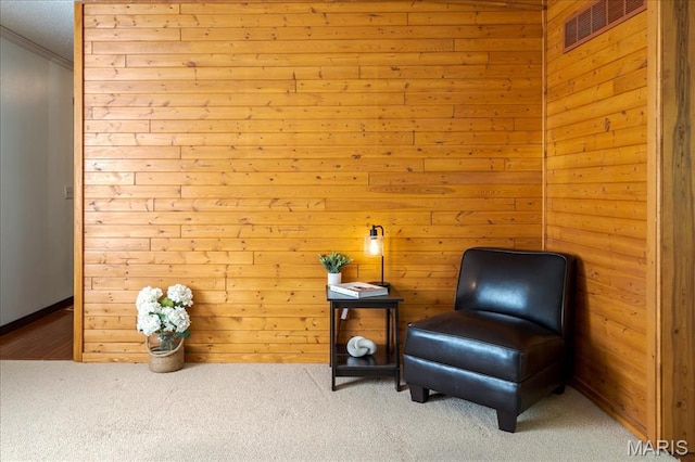 25 Whispering Oaks Dr, Washington, MO 63090 - sitting room featuring carpet floors, wooden walls, and crown molding