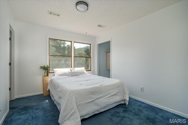 25 Whispering Oaks Dr, Washington, MO 63090 - carpeted bedroom with baseboards and a textured ceiling