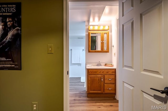 25 Whispering Oaks Dr, Washington, MO 63090 - bathroom featuring wood finished floors and vanity