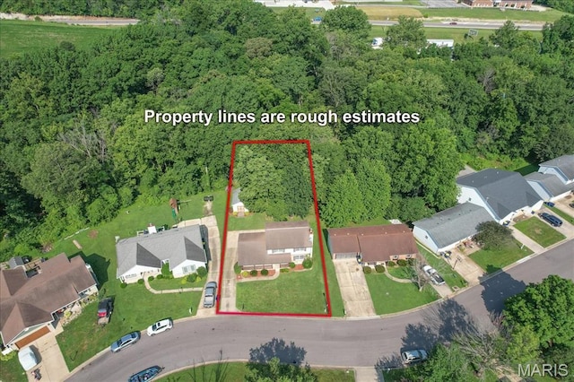 25 Whispering Oaks Dr, Washington, MO 63090 - aerial perspective of suburban area featuring a forest and property boundaries highlighted